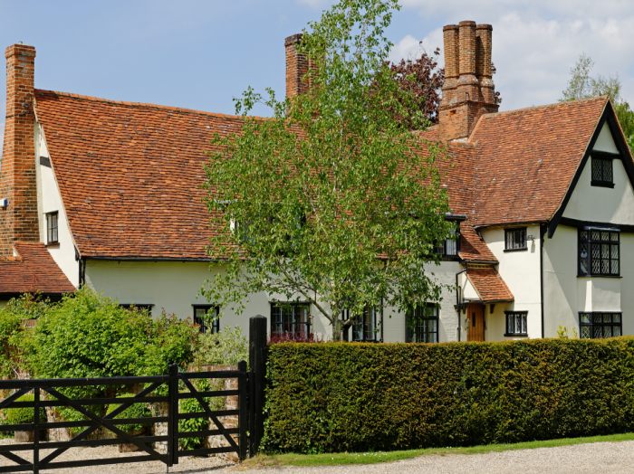 A historic Tudor manor house in an English villag