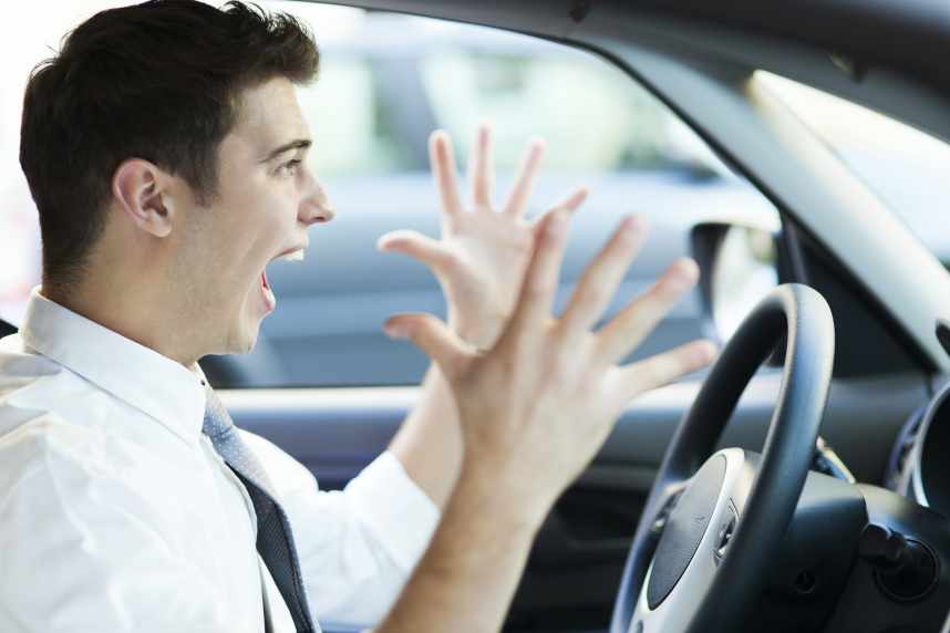 Frustrated man in car