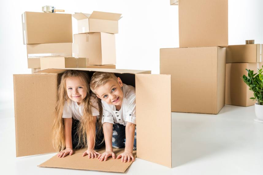 Children in moving boxes